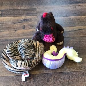 Three webkinz: snake, dinosaur, and seahorse